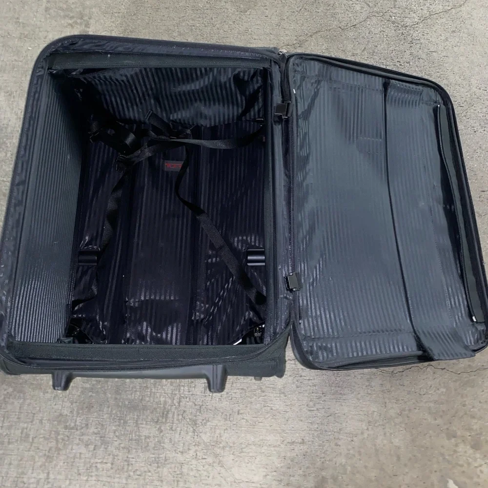 TUMI Check On Suitcase
